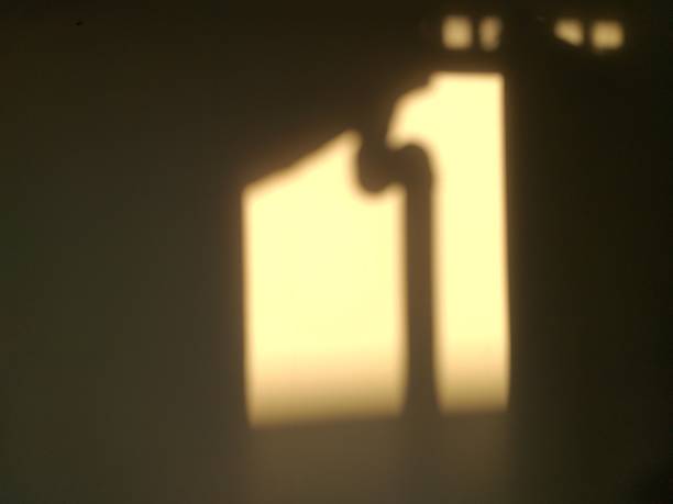 istock photo of shadow silhouettes on the wall 1320639607