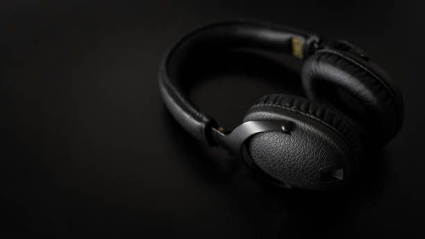 istock New modern stereo headphones on black background 1320642097