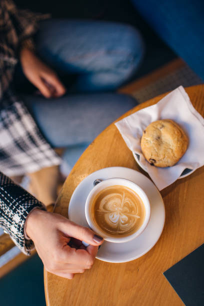 istock Coffee espresso holding girl 1320643581