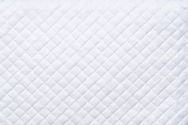 istock closeup white and soft baby cloth diapers or disposable flat bed sheet with square background and texture 1320644910