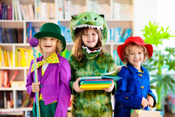 Kids in book character costume. School party. Kids in book character costume. School dress up party. English language and literature study for young children. Reading for primary school kid. Library event. Fun learning. fancy dress costume stock pictures, royalty-free photos & images