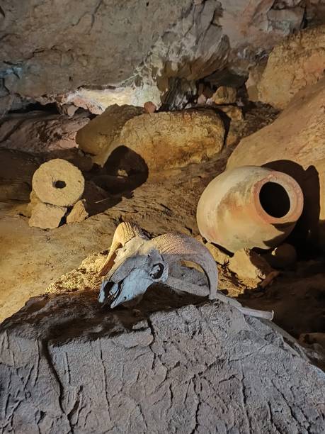 istock Underground mountain cave with river and stalactites and stalagmites 1320649142