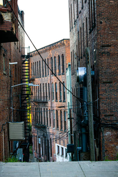 istock Brick Alley with Wires & Windows 1320650789