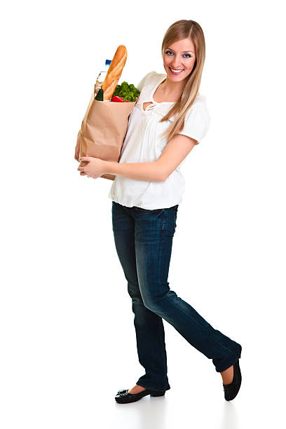 istock Woman with vegetables isolated on white 132065482