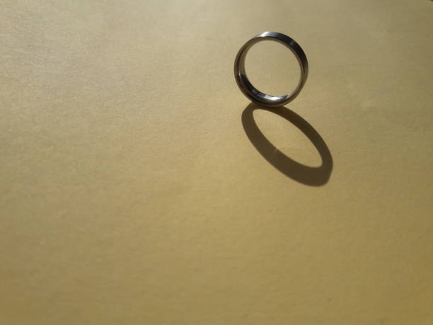 istock Ring photo on yellow background 1320654859
