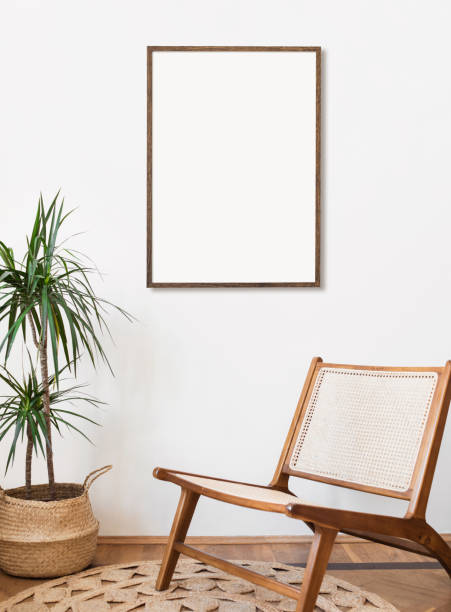 istock Blank picture frame mockup on a white wall. Artwork in interior design 1320655010