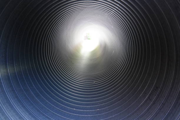 Light at the end of the tunnel Concept in light at the end of the tunnel or pipe light at the end of the tunnel stock pictures, royalty-free photos & images