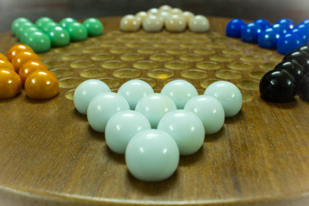 Marbles arranged in Sternhalma, commonly known as Chinese checkers is a strategy board game. Multiplayer board game with good fun time.