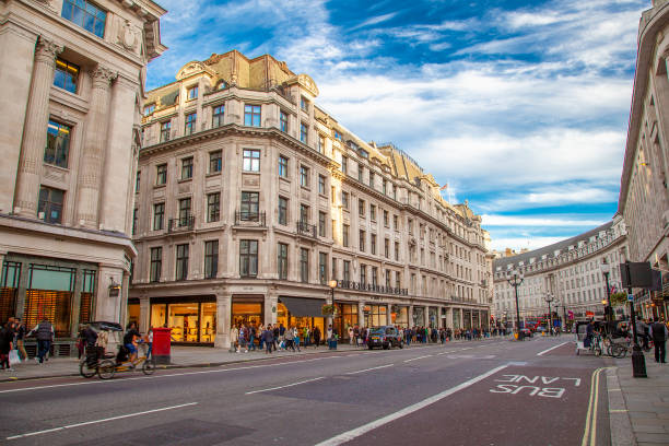 Famous Regent Street in London Regent Street is one of the largest shopping streets in London and it was built between 1811 and 1825 central london stock pictures, royalty-free photos & images