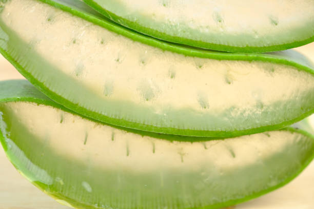 istock Close-up Fresh Aloe vera sliced on a chopping board 1320661612