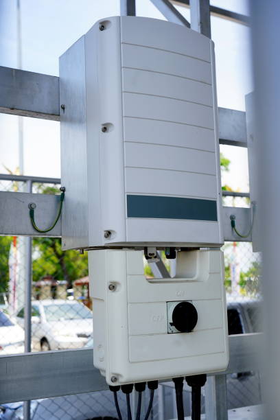 istock Inverter behind the solar panels 1320661932