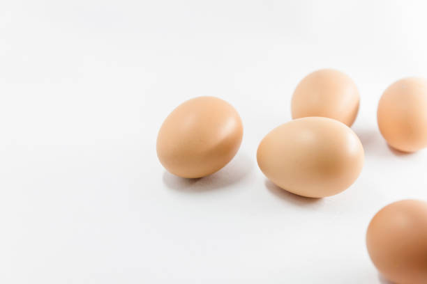 istock Close-up of red eggs on a white background 1320662812