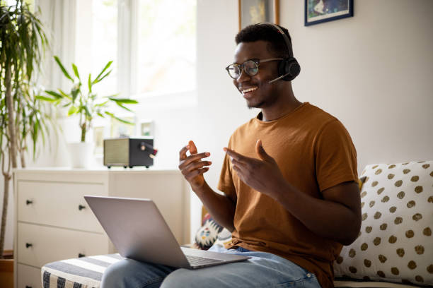 istock Young African American man working from home 1320663009