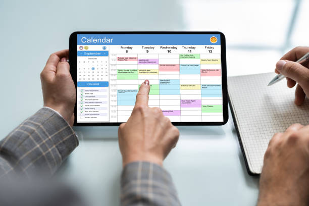 istock Businessperson Looking At Calendar On Digital Tablet 1320664523