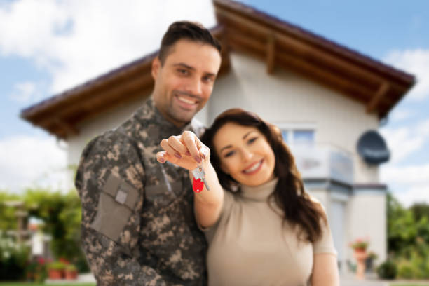istock Happy Couple Holding Home Keys 1320666674