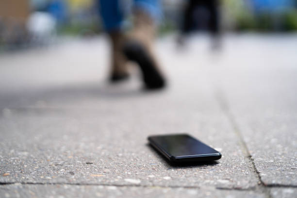 istock Woman Lost Mobile Phone 1320666718