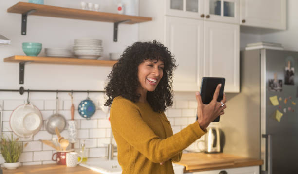 istock Woman Having A Video Conference From Her Home 1320668621