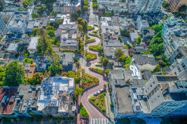 Aerial view of Lombard Street An aerial view looking down the crooked Lombard Street in San Francisco.Flowers blooming on this famous street. san francisco california stock pictures, royalty-free photos & images