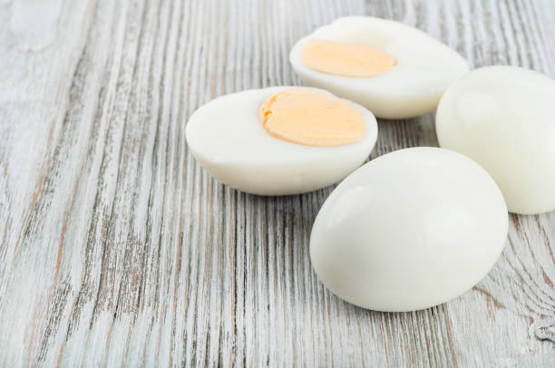 istock Boiled hen eggs on a wooden background 1320670910