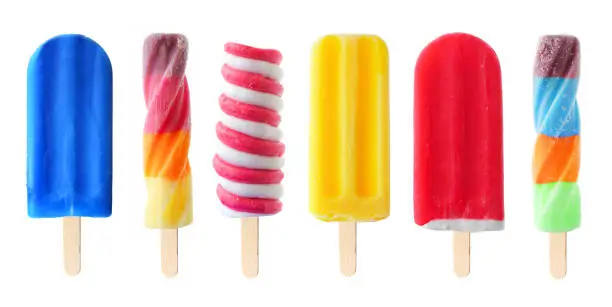 Photo of Set of unique colorful summer popsicles isolated on white
