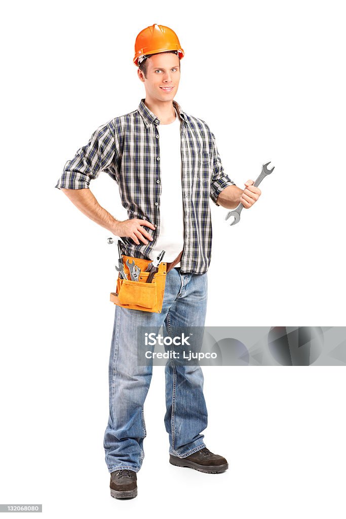 Zuversichtlich und lächelnd Mann für hält ein Schraubenschlüssel - Lizenzfrei Arbeiter Stock-Foto