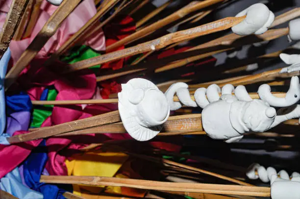 Photo of hats and reeds that adorn the floats