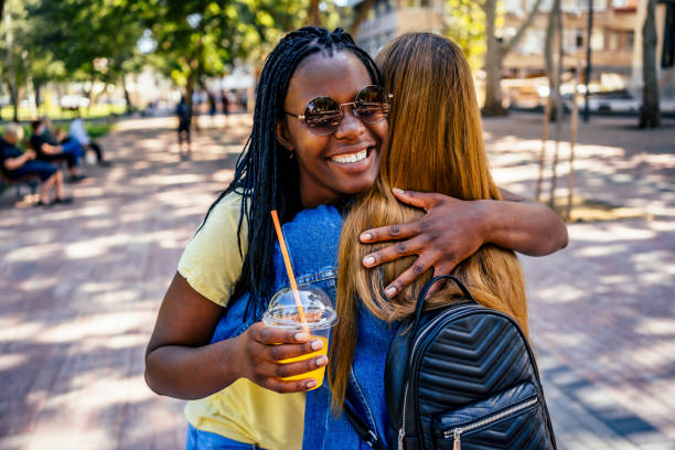 istock Young women friends hugging 1320684082