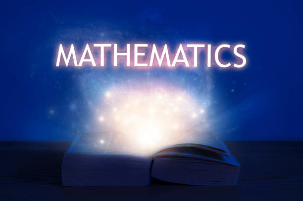 istock Light coming from open book with word mathematics. Education concept. 1320686060