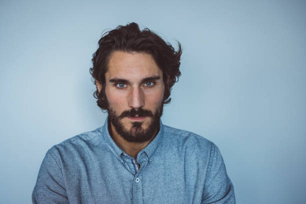 istock Portrait young confident smart businessman look at camera 1320686121