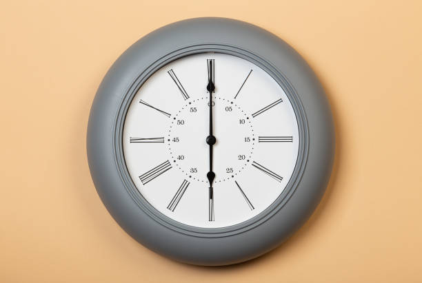istock Roman Wall Clock show six o'clock 1320694697
