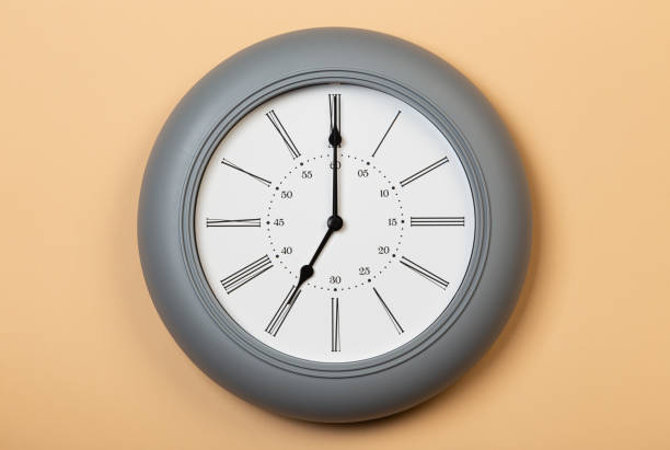 istock Roman Wall Clock show seven o'clock 1320694700