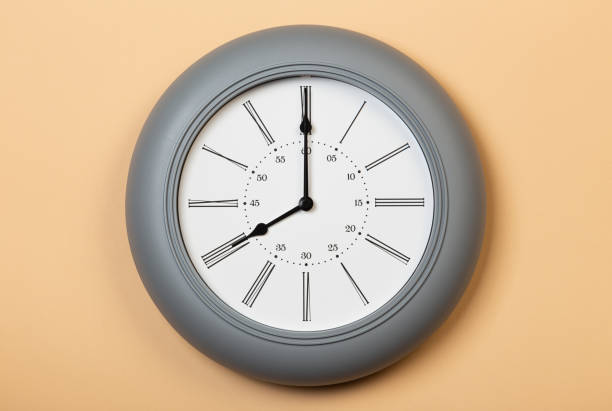 istock Roman Wall Clock show eight o'clock 1320694711