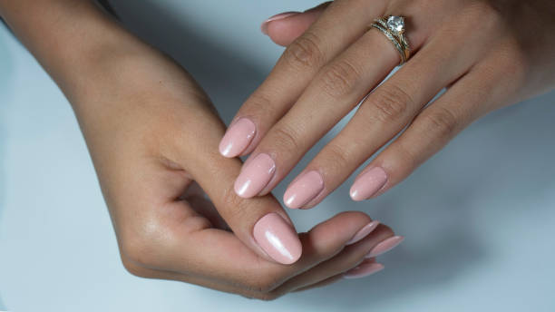 istock nude nail art manicure. 1320694942