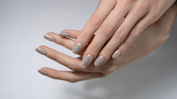 istock nude nail art manicure. 1320695069