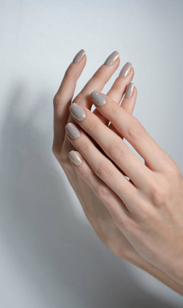 istock nude nail art manicure. 1320695094