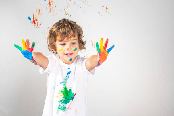 Boy Showing Colorful Paint on His Hands