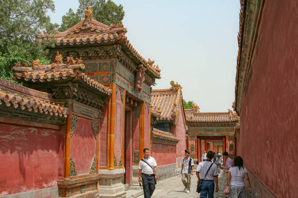 Tourists explore the Forbidden City