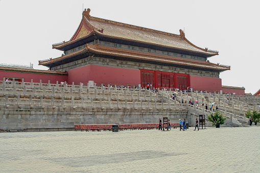 Tourists explore the Forbidden City