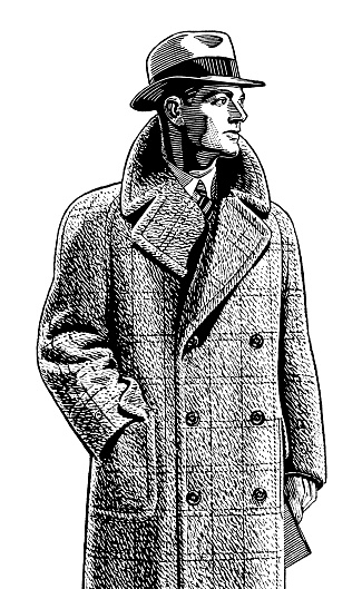 Man Wearing Overcoat and Hat