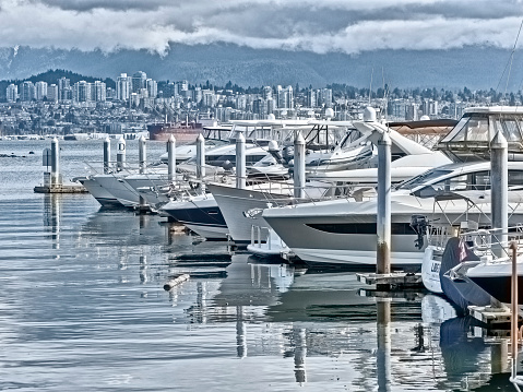 Yachts with North Vancouver skyline in British Columbia