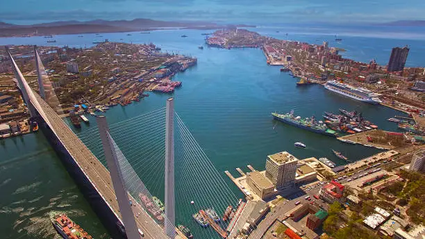 Aerial view of the Vladivostok city landscape with a view of the Golden Bridge