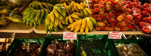 istock fresh bananas at a market in Hawaii 1320721196