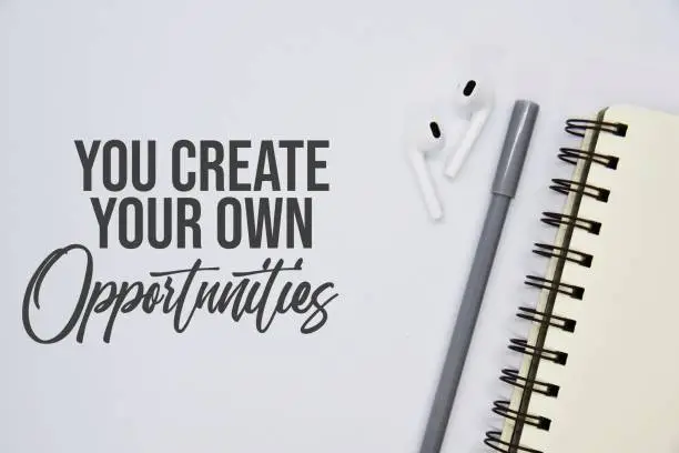 Photo of 'You create your own opportunities' quote.