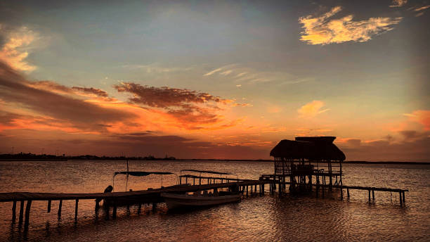 istock sunset over on the pier over the river 1320724593