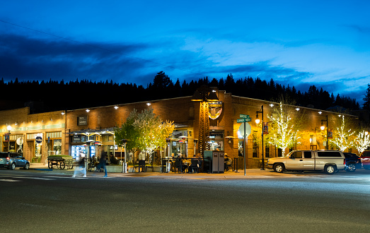 Truckee, CA USA - May 14, 2021: Diners sit outside at the Bar of America in downtown Truckee.