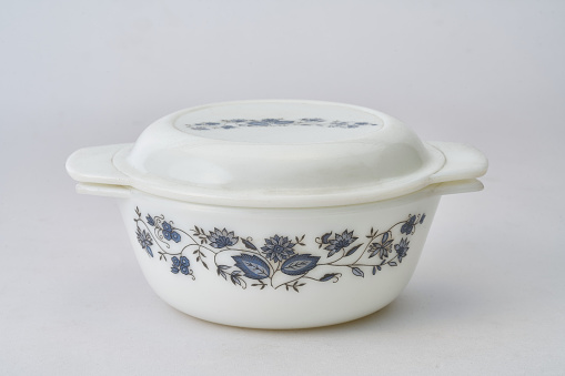 White porcelain rice bowl with lid on white background