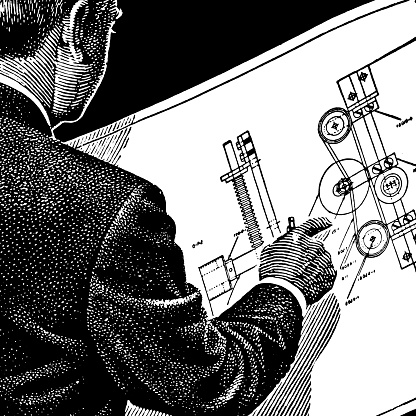 Man Looking at blueprints