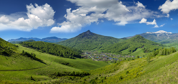 Panoramic view of countryside in Altai mountains, sunny summer day