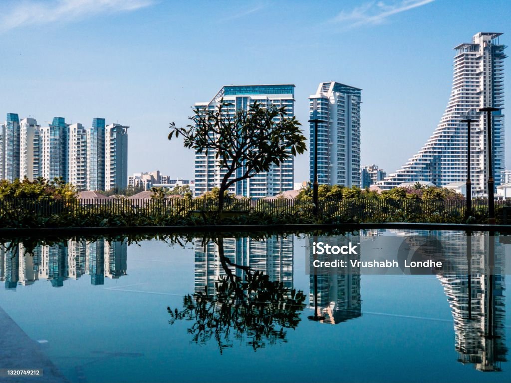 Cityview City skyline and it’s reflection on water India Stock Photo