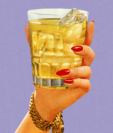 Woman's Hand Holding Drink